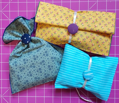 Shopping Reusable Gift Bags in bright fabrics with co-ordinated hand-covered button ribbon tie